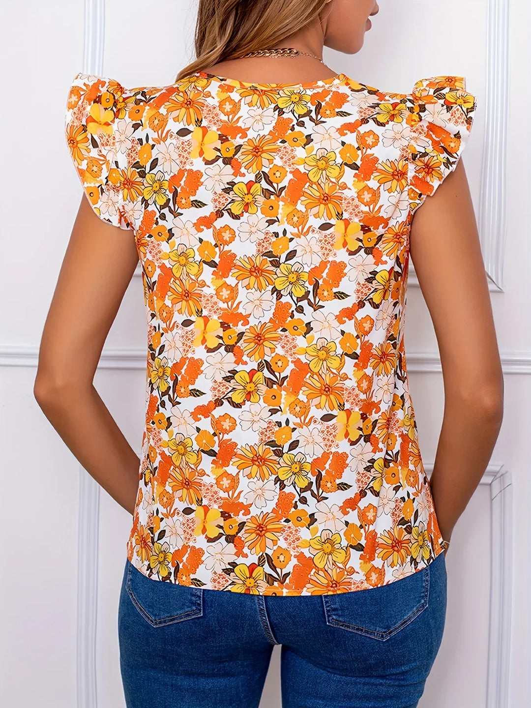 Damski top w pomarańczowe kwiaty